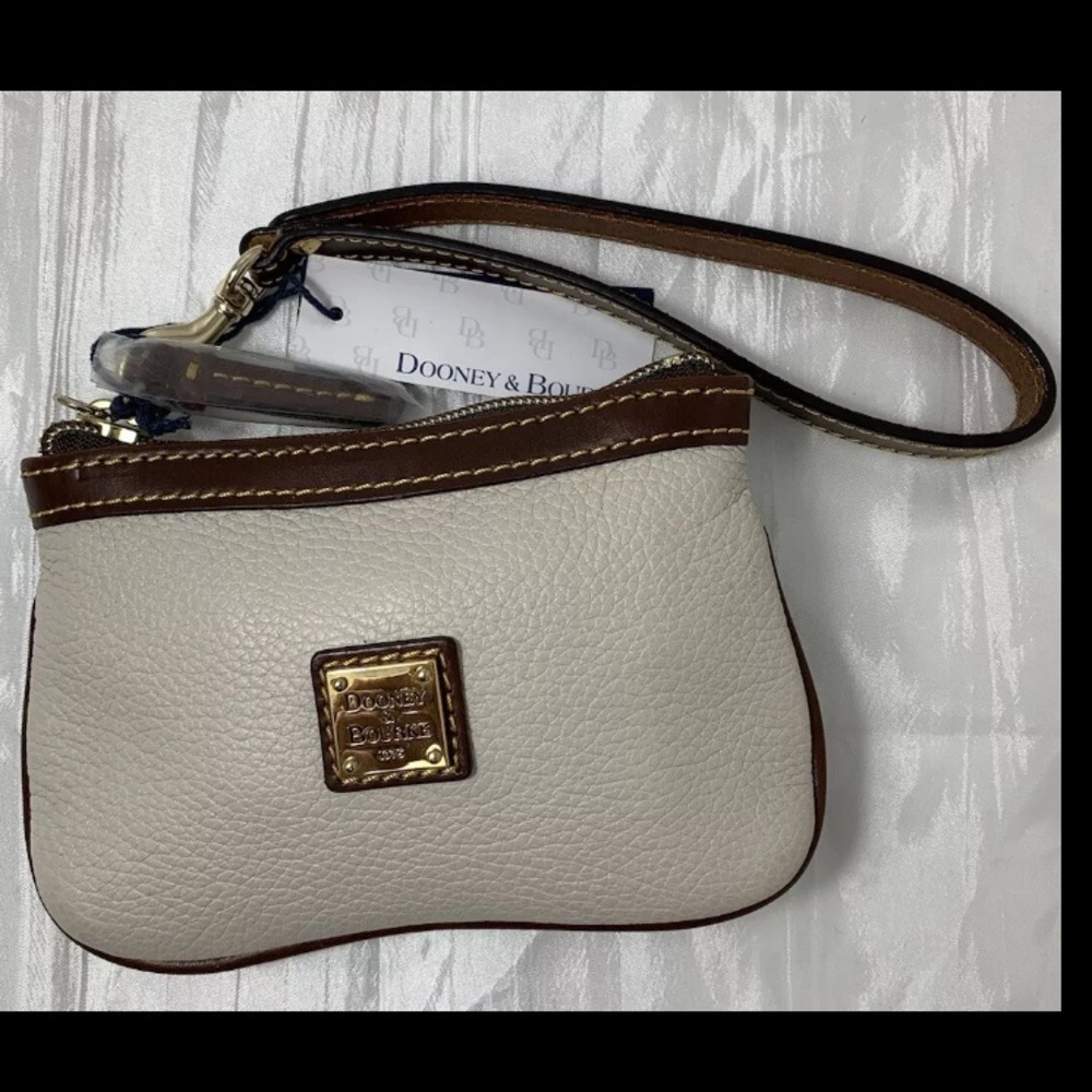 Dooney & Bourke Ivory Pebble Grain Medium Wristlet H 4" x W .5" x L 6"